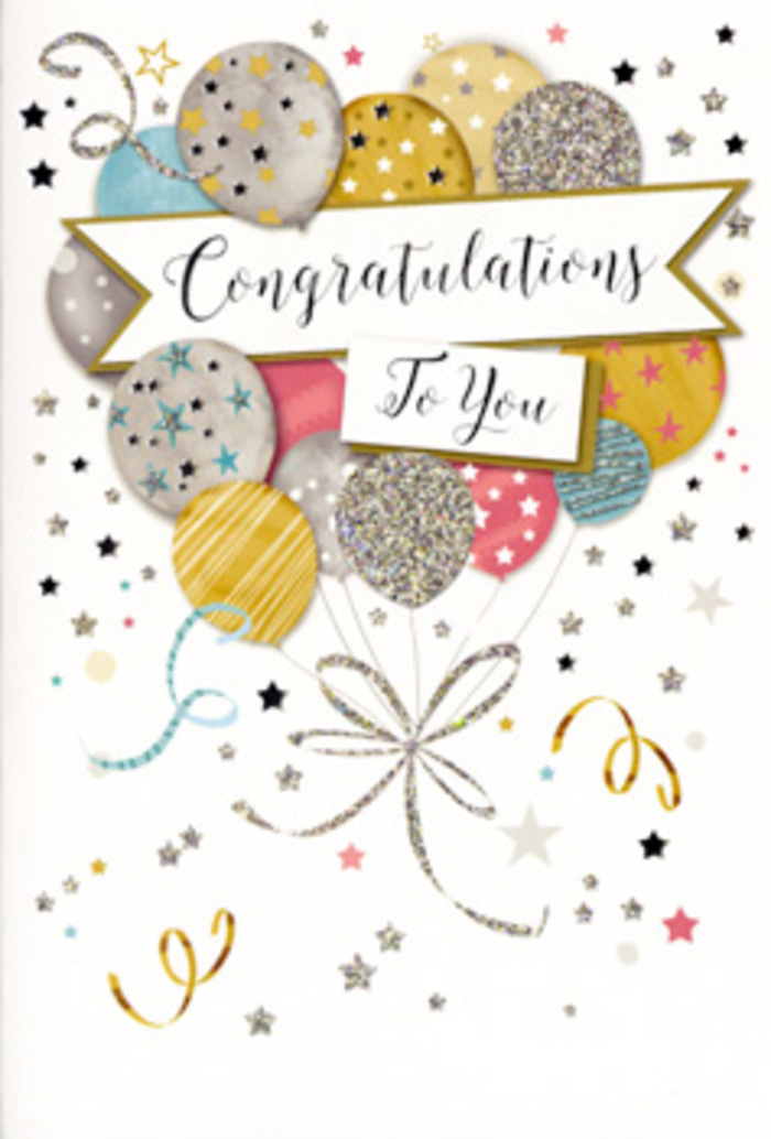 The congratulations card shown here feels like a pocket-sized celebration, perfectly suited to the contemporary, waterside character of Leamouth. At its centre is a generous arrangement of illustrated balloons clustered together like a festive bouquet, rising in a loose, upward sweep that naturally guides the eye from the bottom of the card toward the top. The balloons come in a carefully chosen mix of metallic and soft pastel tones: rich gold, bright silver, warm champagne, cool sky blue, delicate blush pink, and soft grey. Many of them are decorated with dainty motifs-scattered stars, slim vertical or diagonal stripes, and sections of shimmering glitter-so that each balloon has its own subtle identity, as if each one represents a different success or happy memory. The surfaces look gently reflective, with highlights suggesting the sheen of foil balloons under soft indoor lighting. From the base of the cluster, ribbons fall in elegant, curling lines of gold and silver, looping downwards like the bends of the Lea as it meets the Thames. Surrounding the balloons, small metallic stars, dots of confetti, and flowing swirl designs float across a pale, almost champagne-coloured background, creating the impression of movement and quiet excitement. Cutting gracefully through the centre, a banner unfurls, gently arched and anchoring the composition. Upon it, the phrase Congratulations To You is written in sweeping, refined script, the letters slightly thicker and more pronounced than the rest of the illustration so the sentiment stands clearly at the heart. The overall impression is one of warm pride and polished joy, the type of card a customer might choose from Flower Delivery Leamouth to accompany bold, fresh flowers for a graduation, new role, or any milestone celebrated in this evolving riverside neighbourhood.
