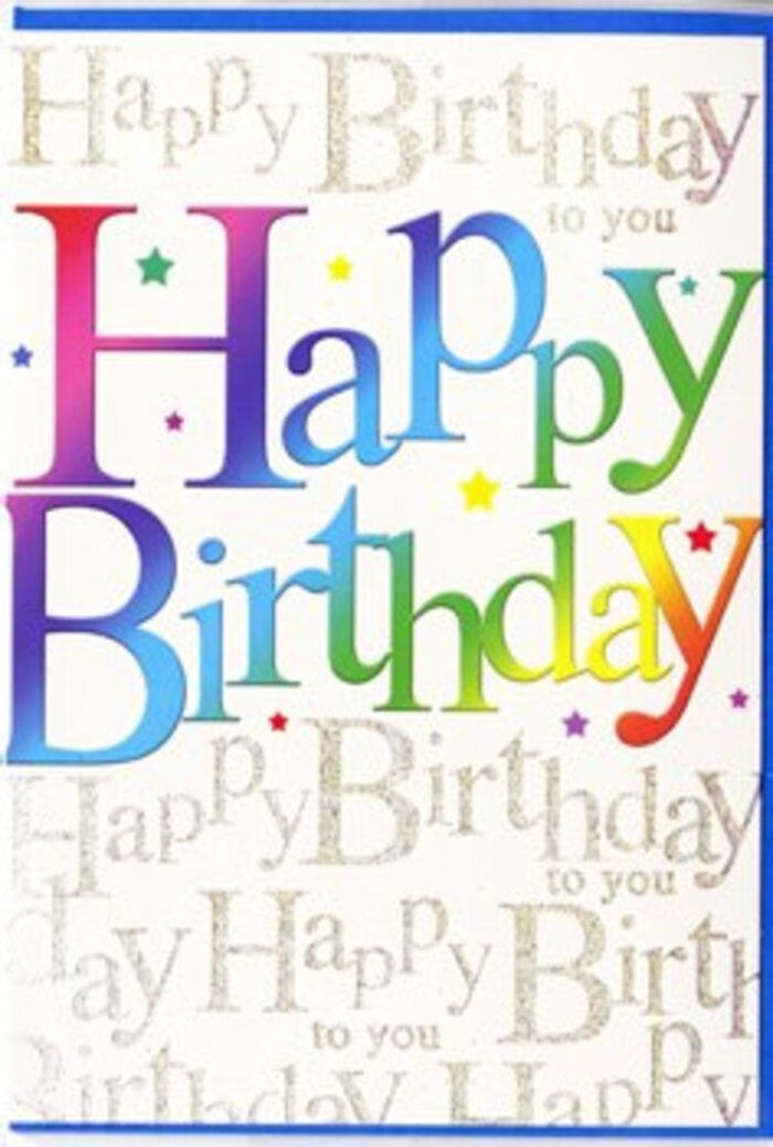 The image shows a birthday card that feels tailor-made for a joyful Leamouth celebration, its design brimming with colour and warmth. At the heart of the card, the phrase Happy Birthday stretches from side to side in big, friendly letters that command attention without feeling heavy. Each letter is dipped in a different vibrant colour, forming a continuous rainbow sweep across the front. The sequence begins with juicy crimson and cerise, moves through bright tangerine and warm coral, then into lagoon blues, teal, cool emerald, and finally soft, glowing yellow, reminiscent of festive lights twinkling near the bends of the River Lea and the Thames. The hues blend subtly at their borders, creating a velvety gradient that lends the typography a lively, almost three-dimensional presence. Behind this rainbow phrase, the background is alive with a delicate overlay of gold script, repeating Happy Birthday to you in an elegant, cursive hand. The lettering appears fine and slightly raised, catching the light in glimmers that suggest a light dusting of gold foil or glitter. This continuous script pattern adds both texture and rhythm, like a gentle musical accompaniment behind the central greeting. Scattered across the surface are tiny sparkles and faint star-like dots, adding a hint of celebratory confetti without crowding the design. The card's finish looks smooth and satin-like, with a calm sheen that would reflect ambient light from a Leamouth home or café where birthday cake and flowers are set out. Overall, the card gives an impression of considered craftsmanship and pure joy, ideal for pairing with a vibrant bouquet when you want your wishes to feel genuinely uplifting.