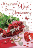 The image shows an anniversary card styled with the romance and detail of a thoughtfully arranged gift scene, as if set out just before a partner walks into a Leamouth living room. At the centre is a rounded bouquet of red roses, their petals lush and velvety, layered so densely they appear almost touchable. The rich crimson tones are softened by surrounding greenery, whose gentle curves and varied leaves add a natural, flowing frame that feels as calm as an early morning walk near Trinity Buoy Wharf. Nearby, an envelope and a matching card rest on the surface, the card opened just enough to reveal elegant, cursive anniversary words that seem to float across the page. A small heart-shaped box, the kind often used for jewellery or sentimental keepsakes, lies close to the flowers, its glossy red finish catching the light. Alongside it, a fine piece of jewellery glints subtly, hinting at a surprise gift chosen with care. Sprinkled across the shiny background are tiny hearts in different sizes and finishes, some shining brightly, others more muted, adding playful yet tender accents. A single butterfly illustration or ornament appears poised above the arrangement, suggesting the light, fluttering feeling of being loved and remembered. Soft, even lighting wraps the entire scene in warmth, casting minimal shadows and allowing the reds, greens, and metallic highlights to stand out clearly. Every element feels harmoniously placed, like a still life created by someone who understands both anniversary traditions and the relaxed, contemporary charm of Leamouth, capturing a moment of celebration that feels both personal and enduring.